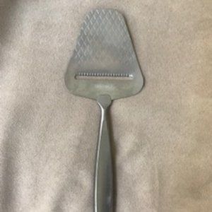BRAND NEW SILVER BOSKA CHEESE SLICER